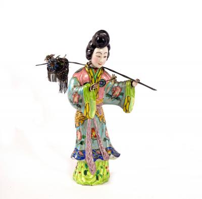 A Chinese export silver and enamel figure