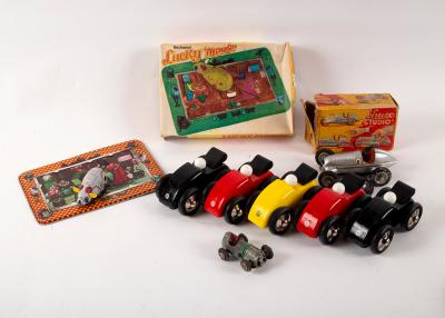 Five wooden cars by Vilac, two Schuco