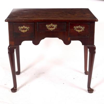 A George II mahogany three-drawer