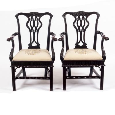 A pair of Chippendale style open armchairs