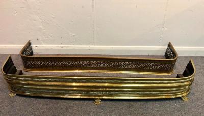 A pierced brass fire curb, 133cm