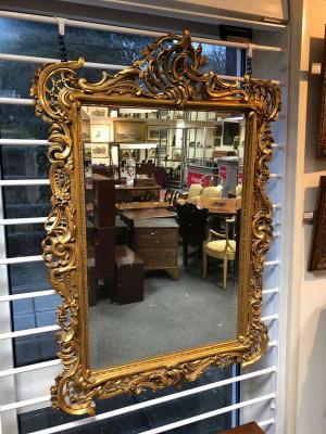 An 18th Century style gilt framed mirror,