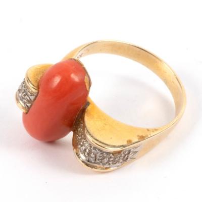 A coral and diamond dress ring