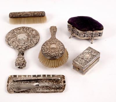 A group of silver dressing table items,