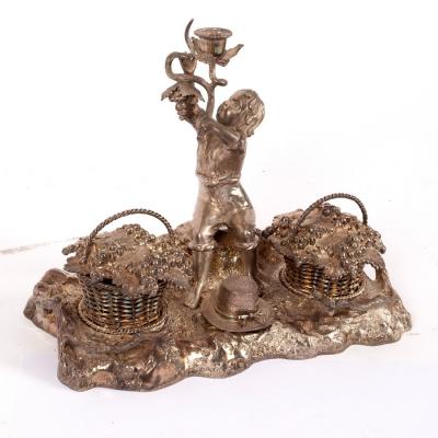 A novelty plated inkstand modelled