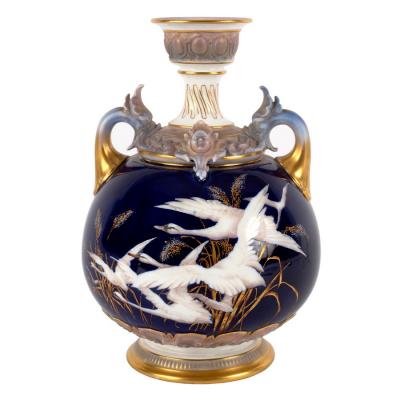 A Royal Worcester blue ground two-handled