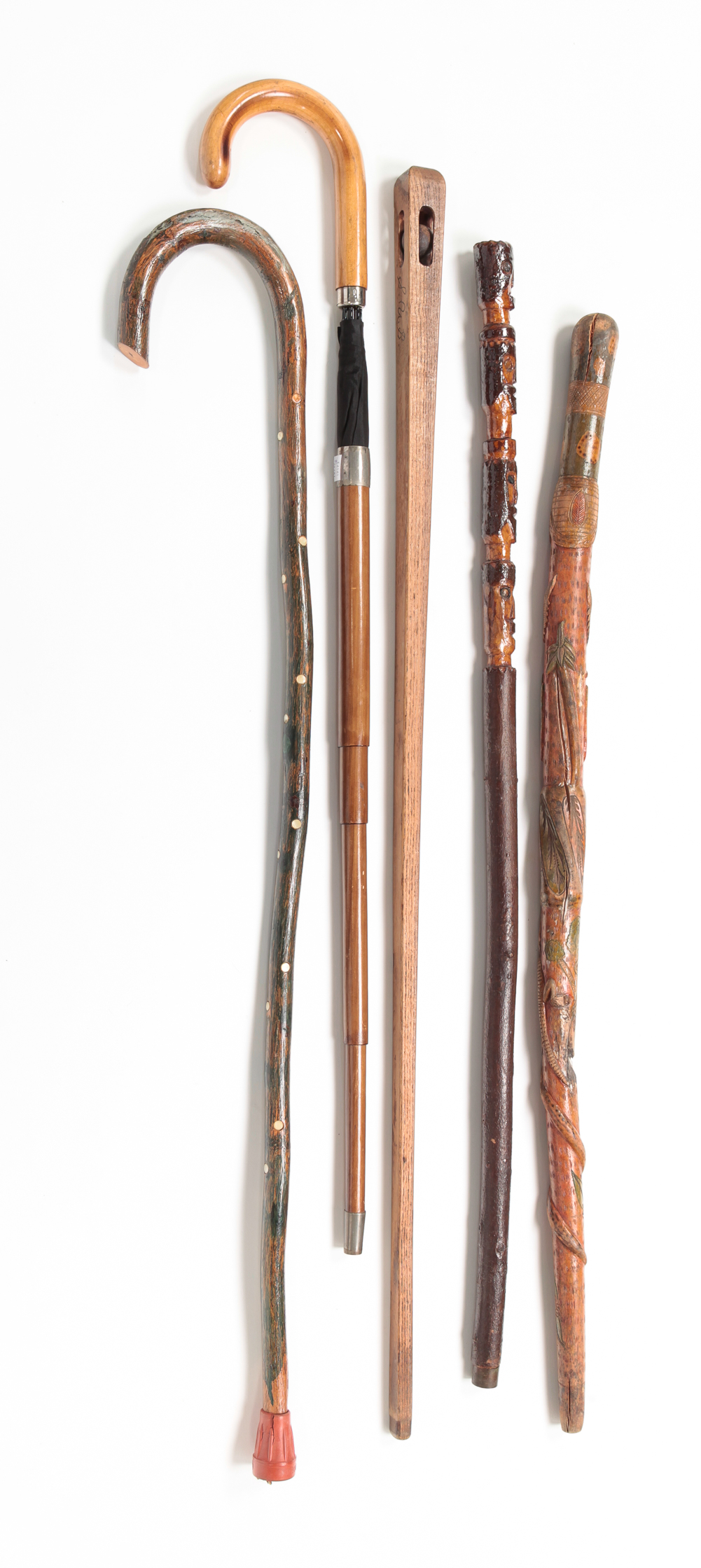 THREE WALKING STICKS AND TWO CANES.