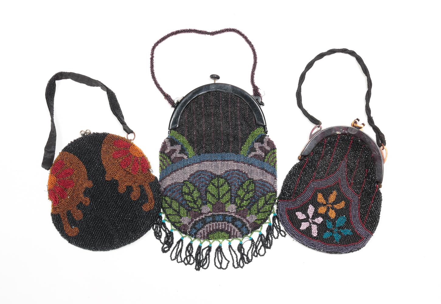 THREE BEADED PURSES. First quarter 20th