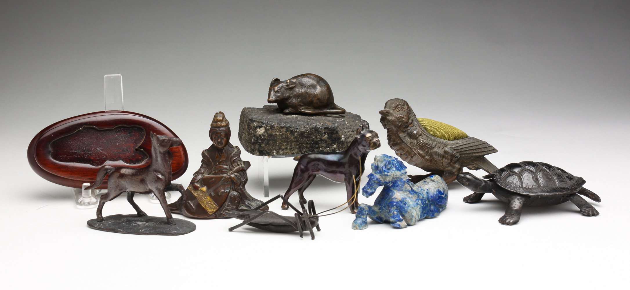 GROUP OF SMALL FIGURINES. American,