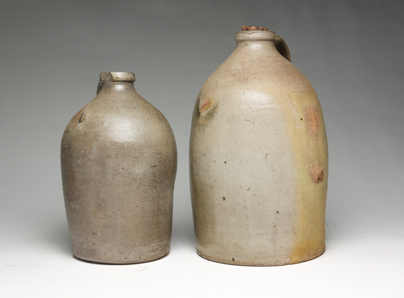 TWO AMERICAN STONEWARE JUGS Mid 2e0017