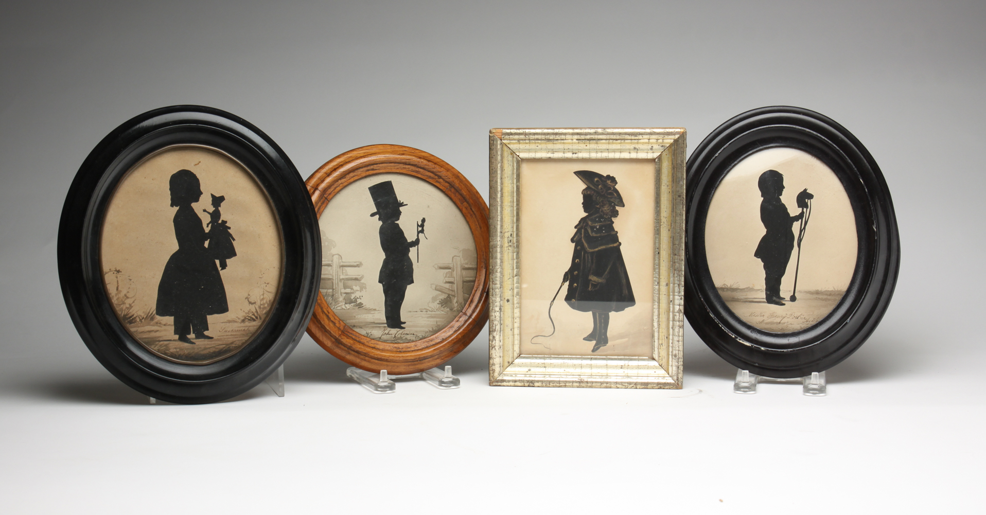 FOUR SILHOUETTES OF CHILDREN. American,