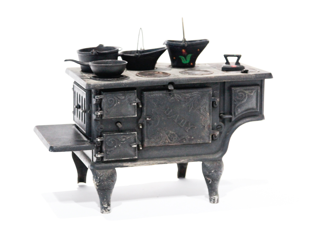 AMERICAN MINIATURE CAST IRON STOVE BABY.