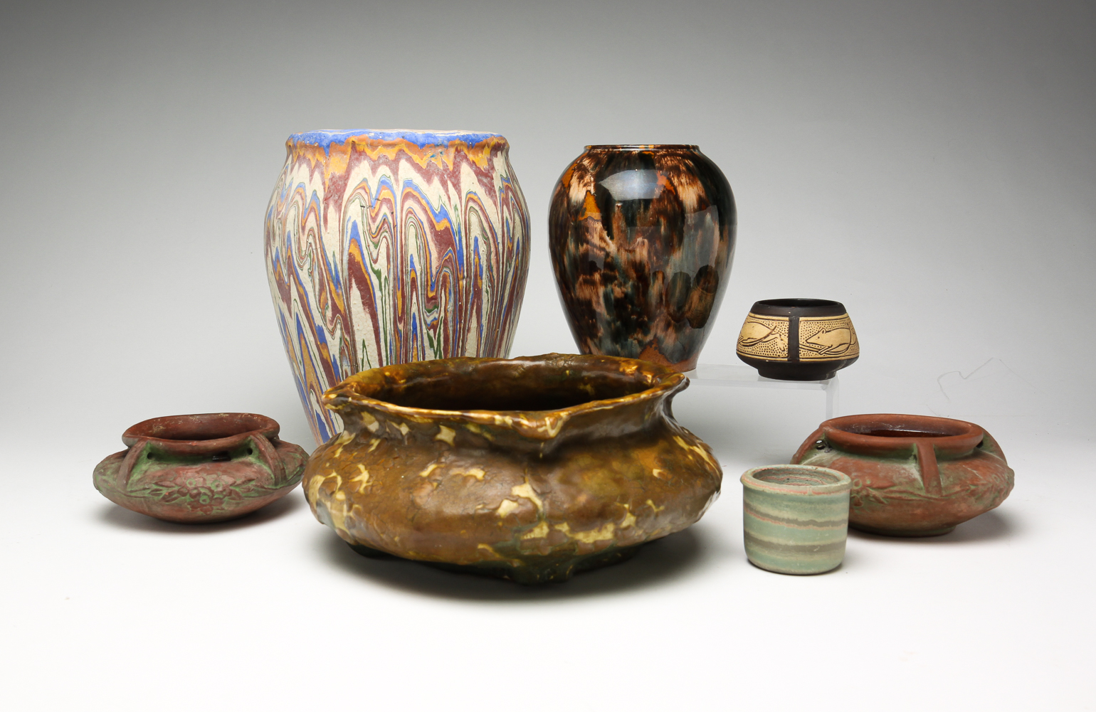 SEVEN PIECES OF AMERICAN ART POTTERY.