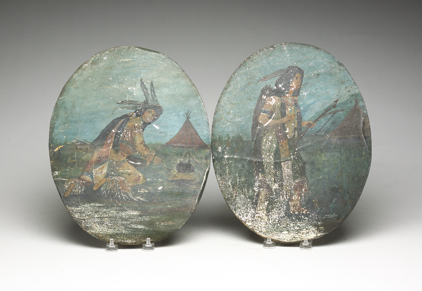 TWO OILS ON TIN OF NATIVE AMERICANS.