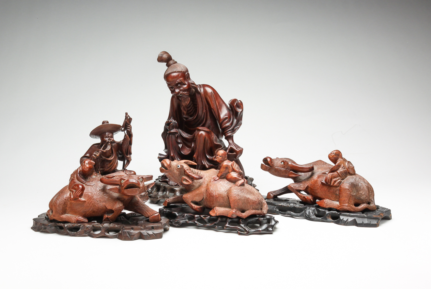 FIVE CHINESE WOOD FIGURAL CARVINGS.