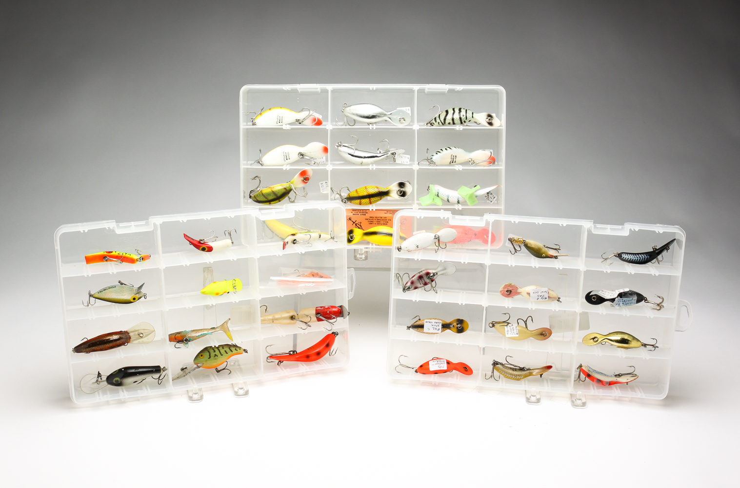 GROUP OF FISHING LURES INCLUDING 2e02ea