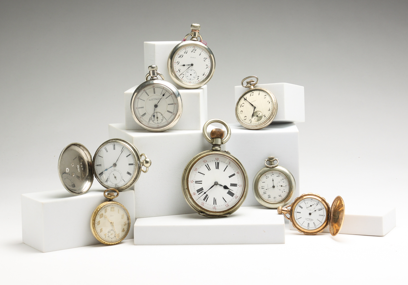 EIGHT TIMEPIECES. Late 19th and 20th