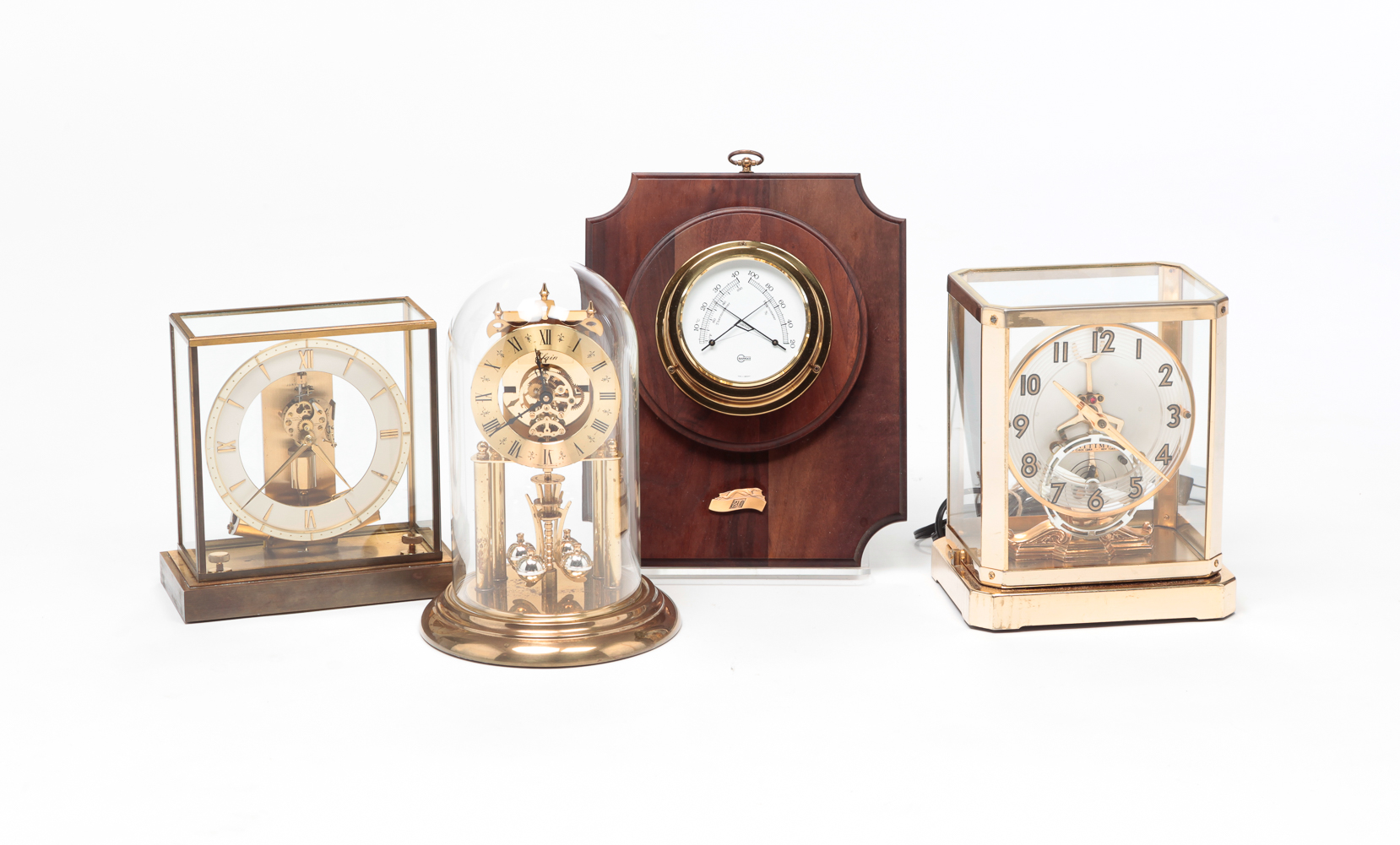 THREE MANTEL CLOCKS AND A HYGROMETER.