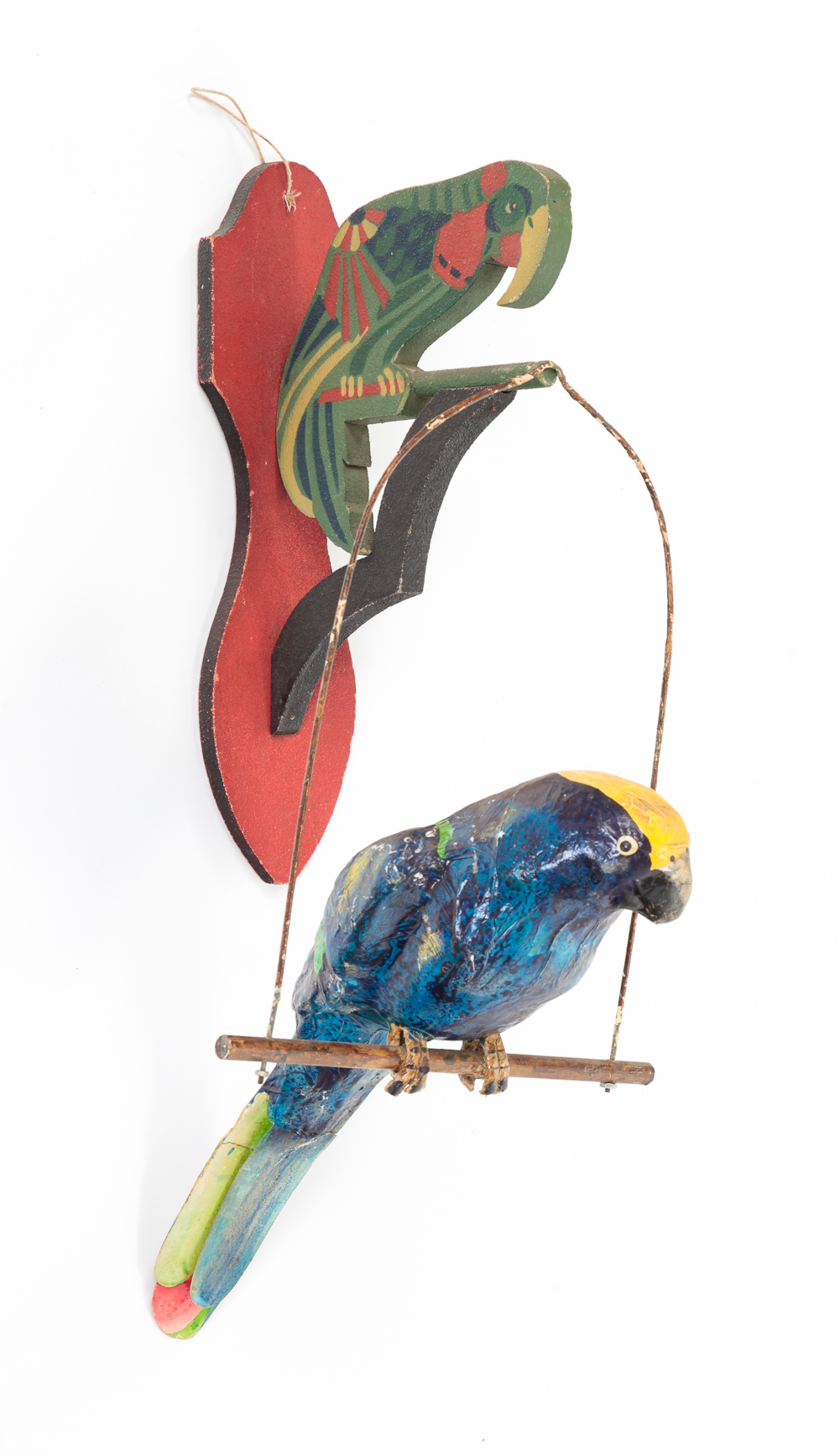 PAPIER MACHE PARROT ON SWING. American,