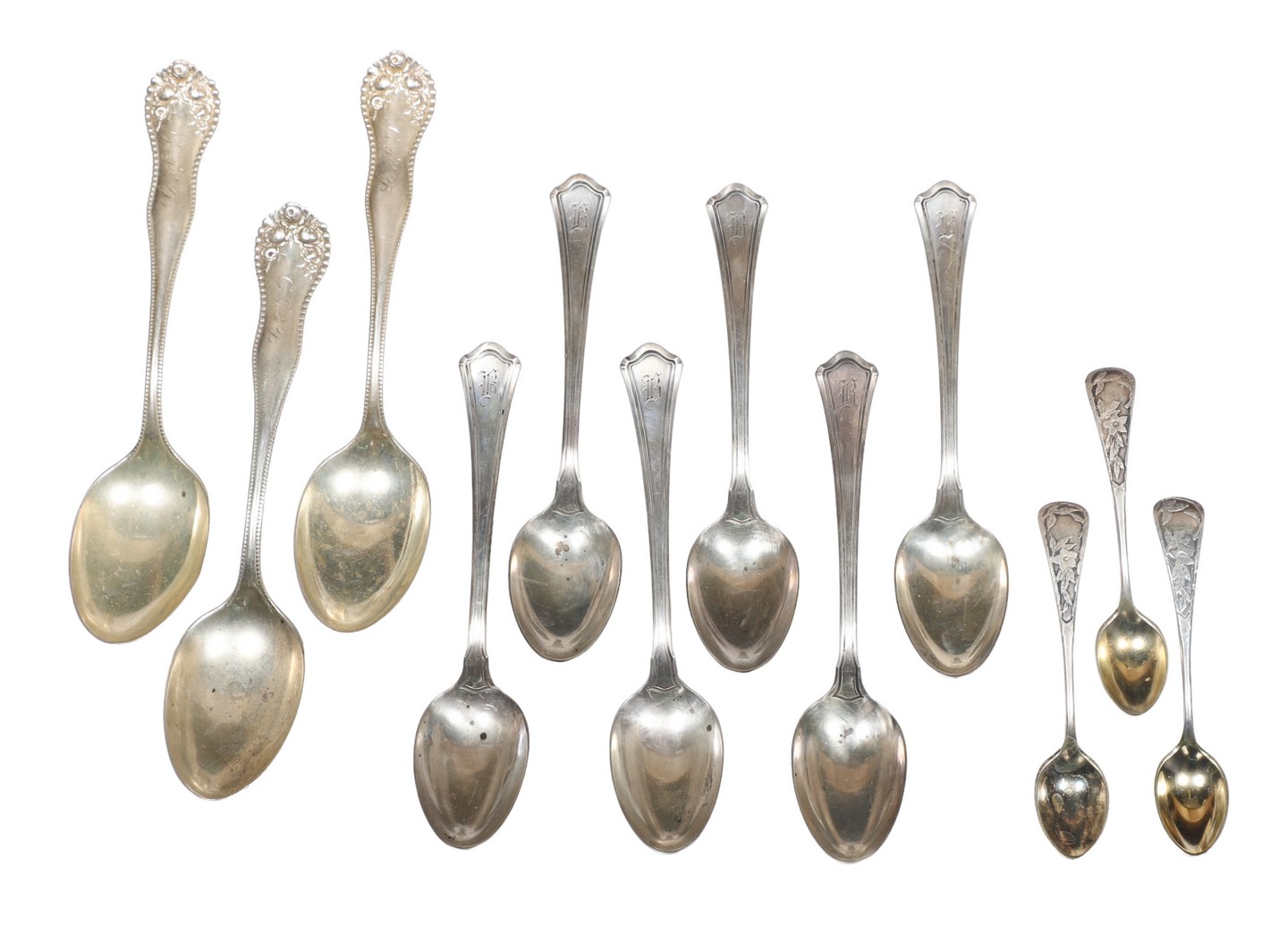 (12) Sterling silver spoons, 9.77 TO,