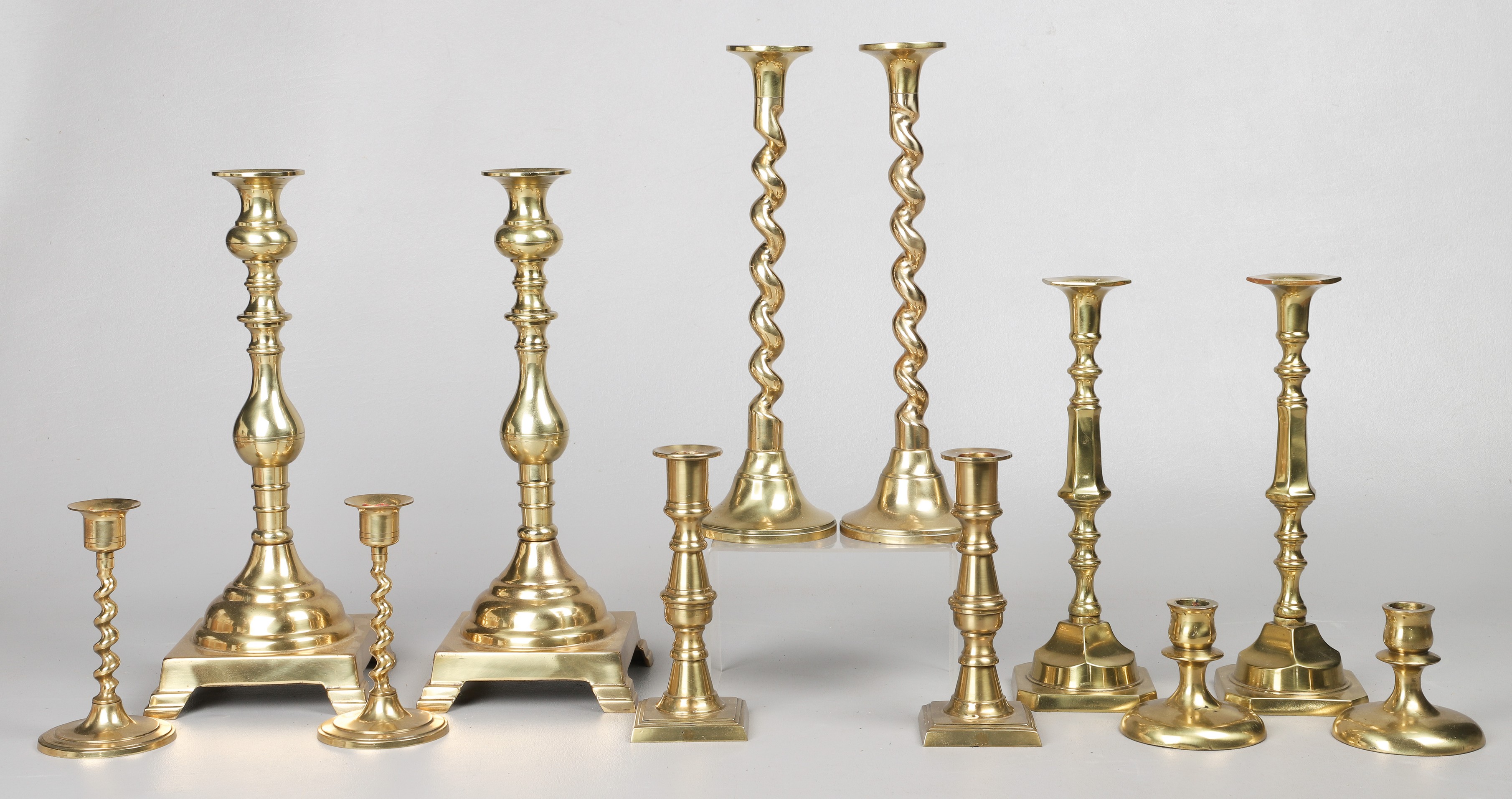 (6) Brass candlestick pairs to