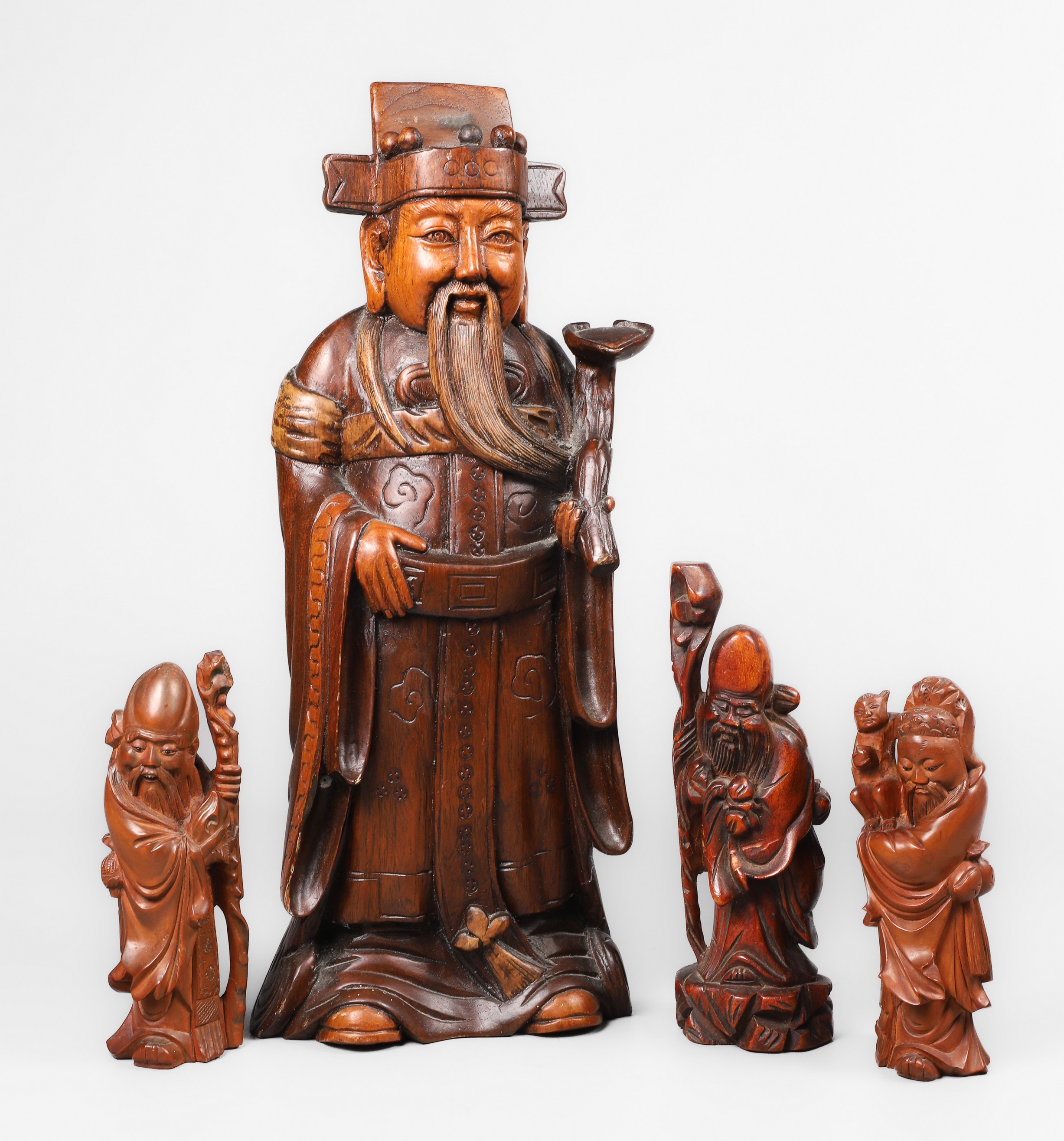  4 Asian carved wood figures  2e0885