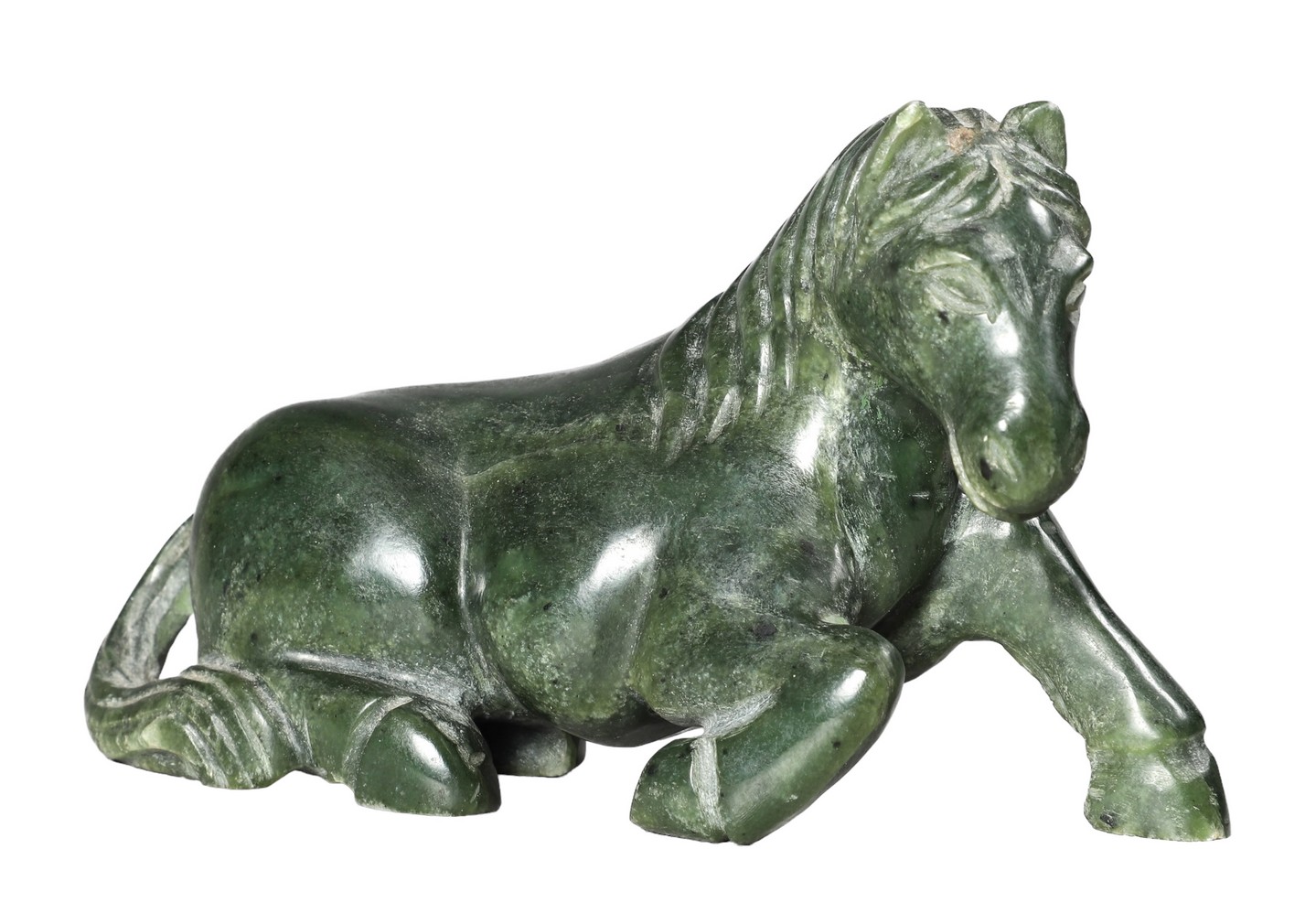 Carved green stone reclining horse figurine,