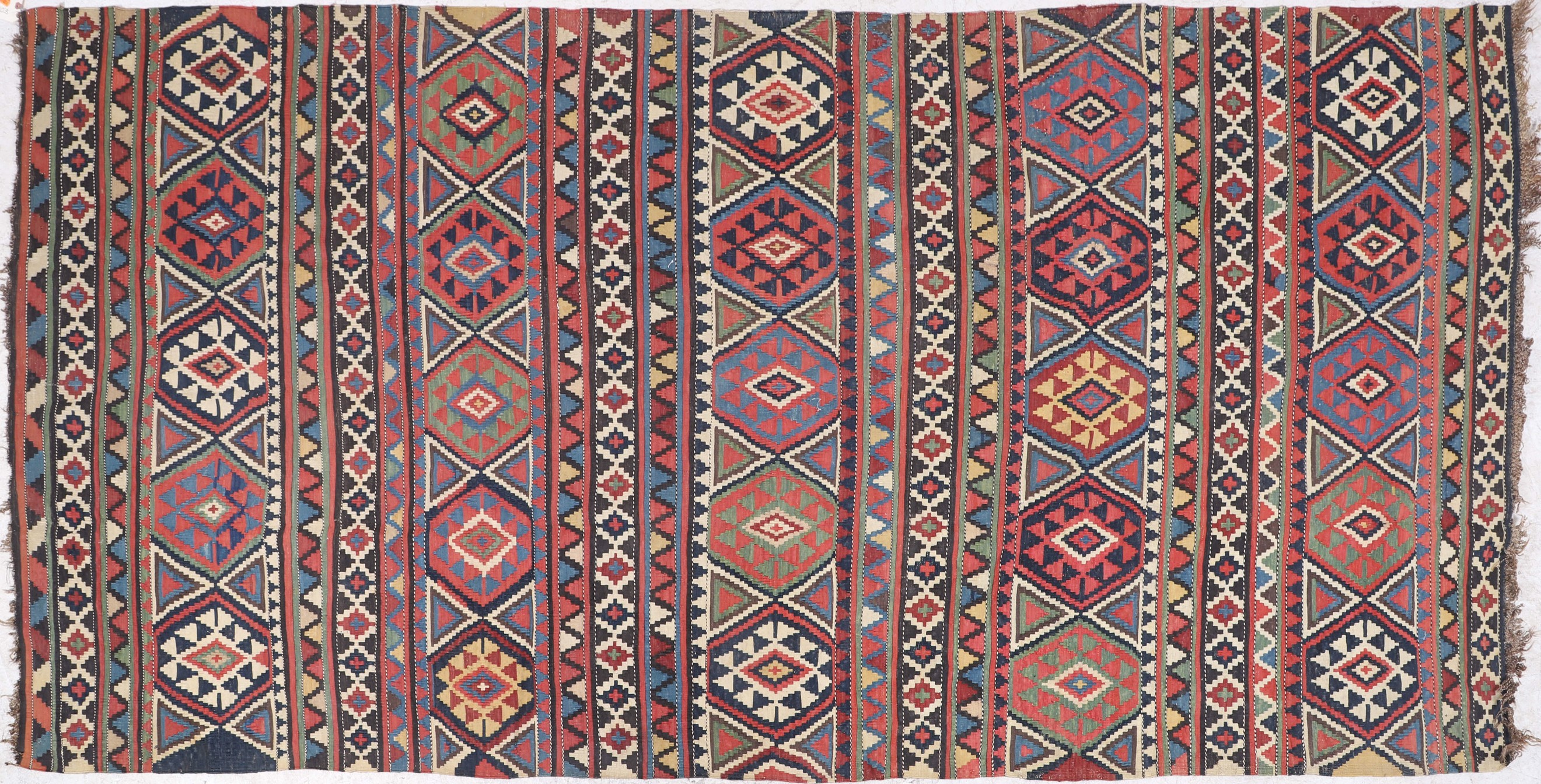 4'10" X 10'3" Kilim, small hole,