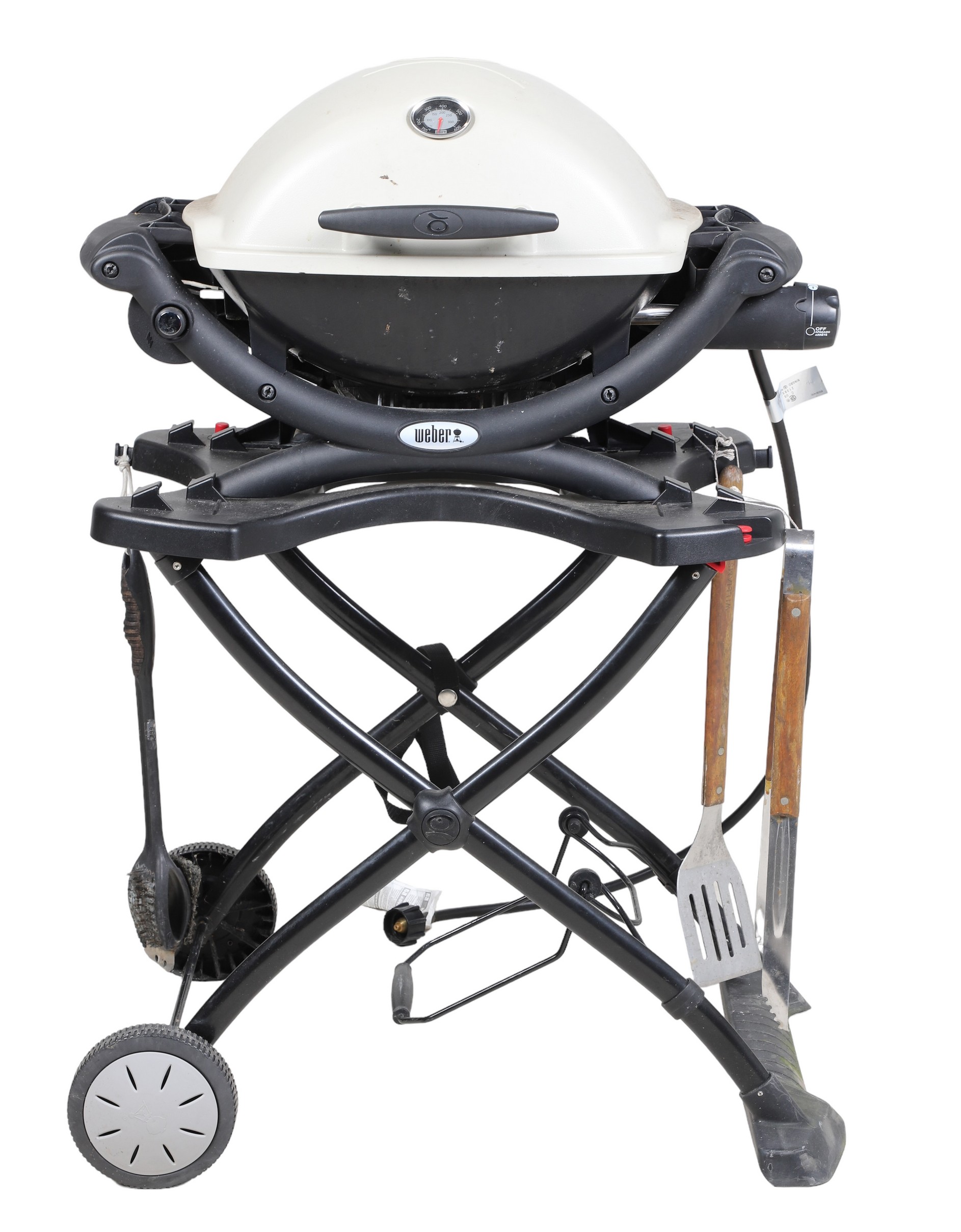 Small Weber grill on stationary cart
