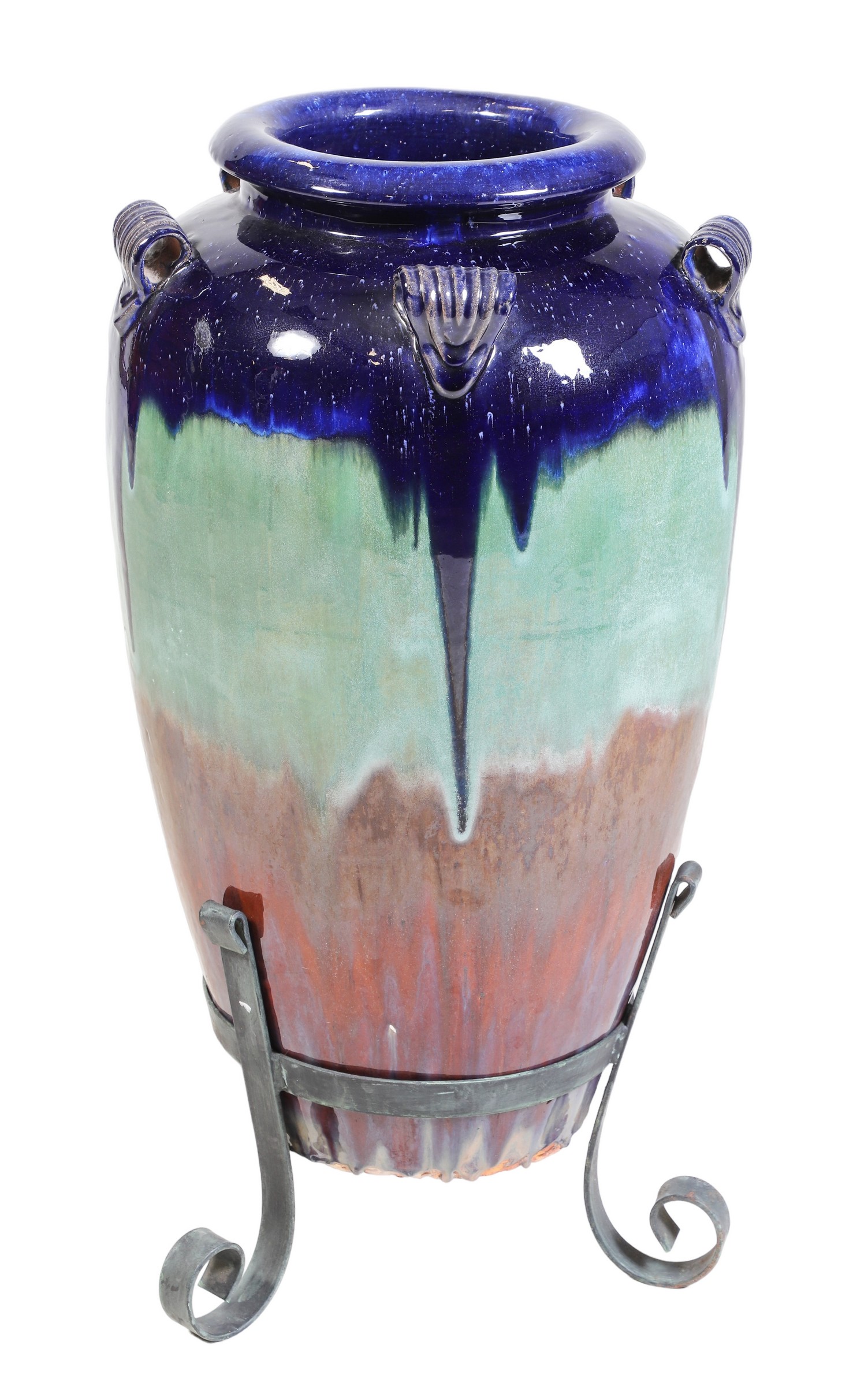 Terracotta glazed vase on iron