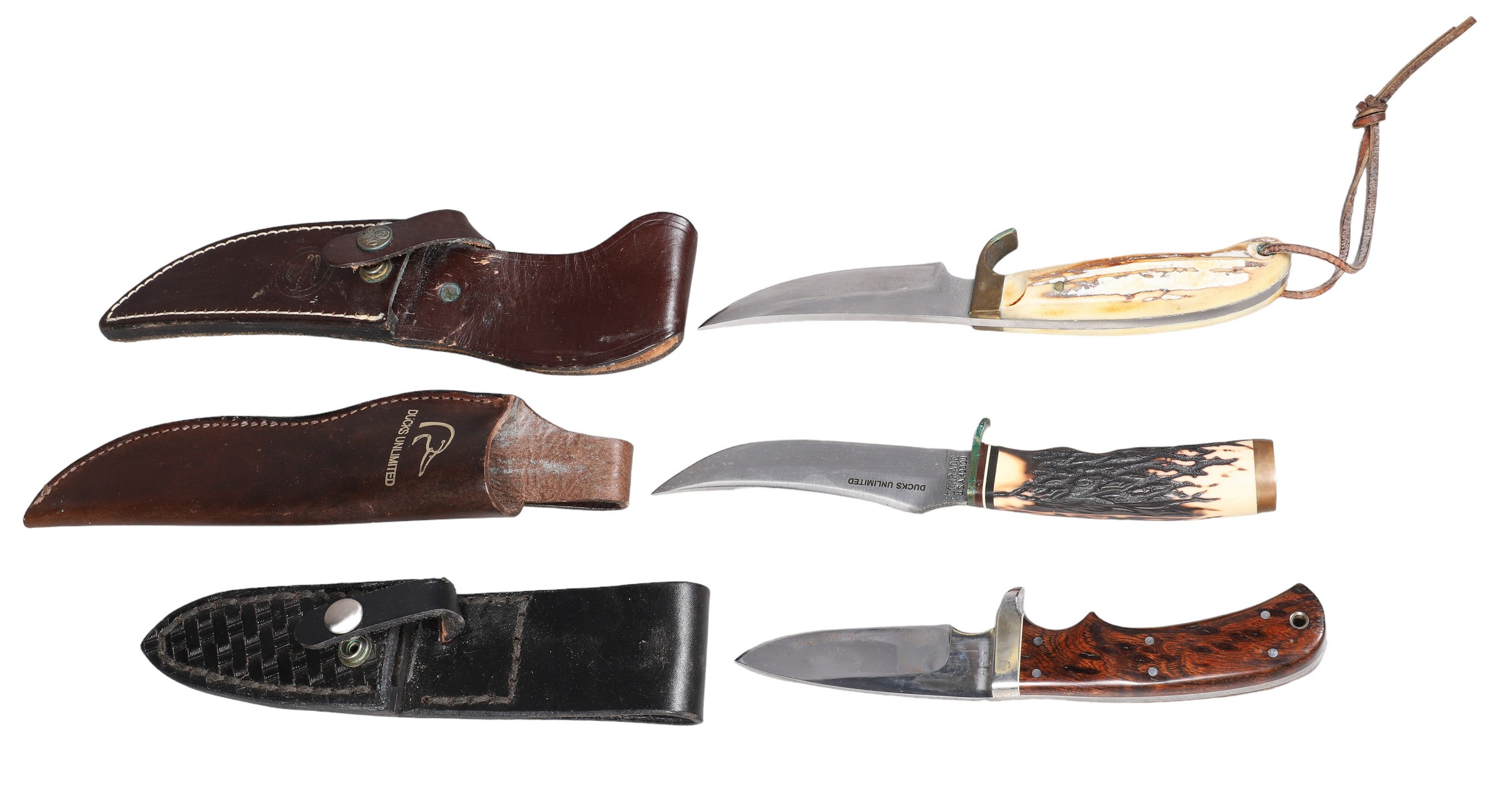 Three belt knives in leather sheaths,