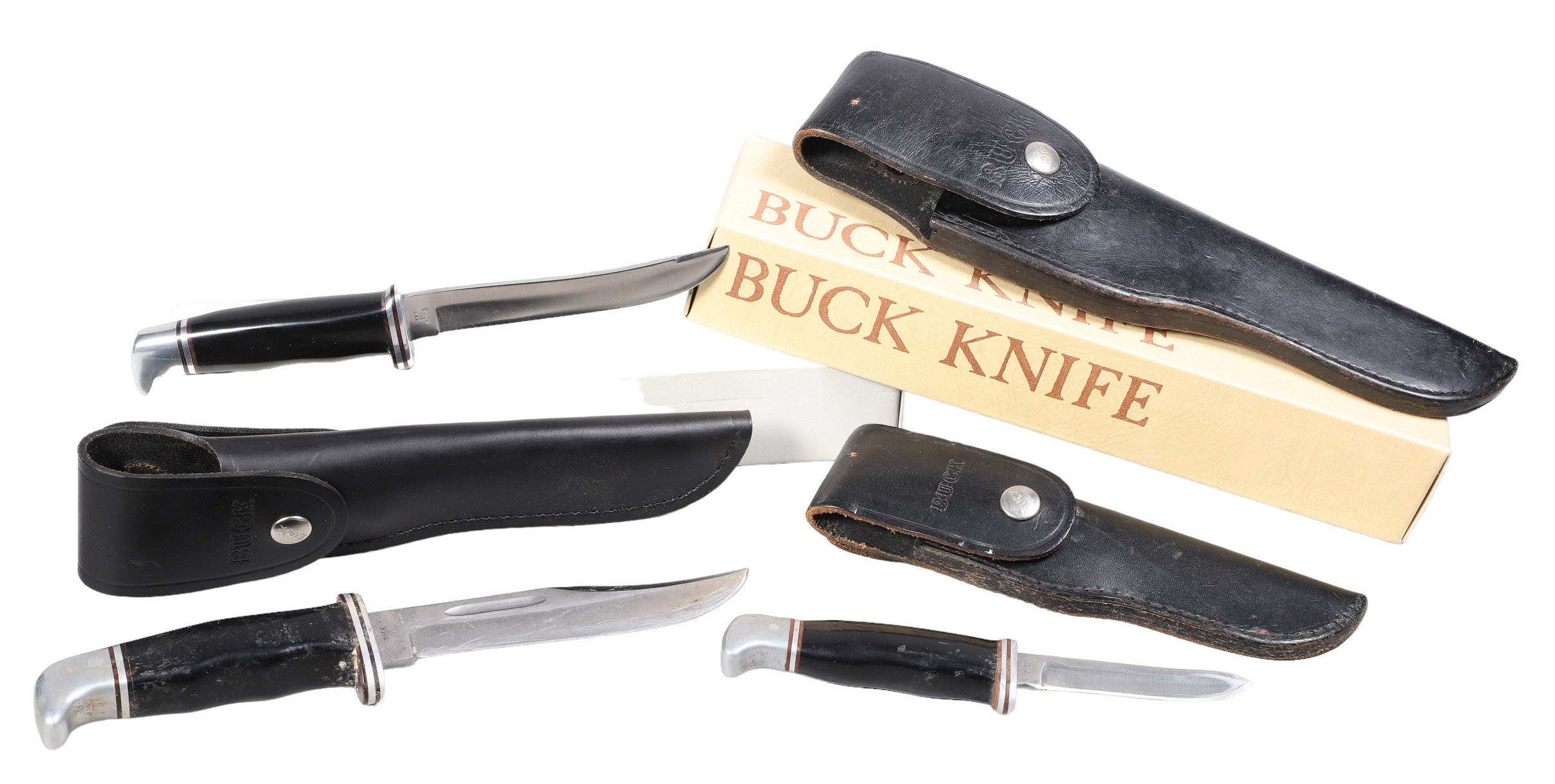 Three knives by the Buck Knife