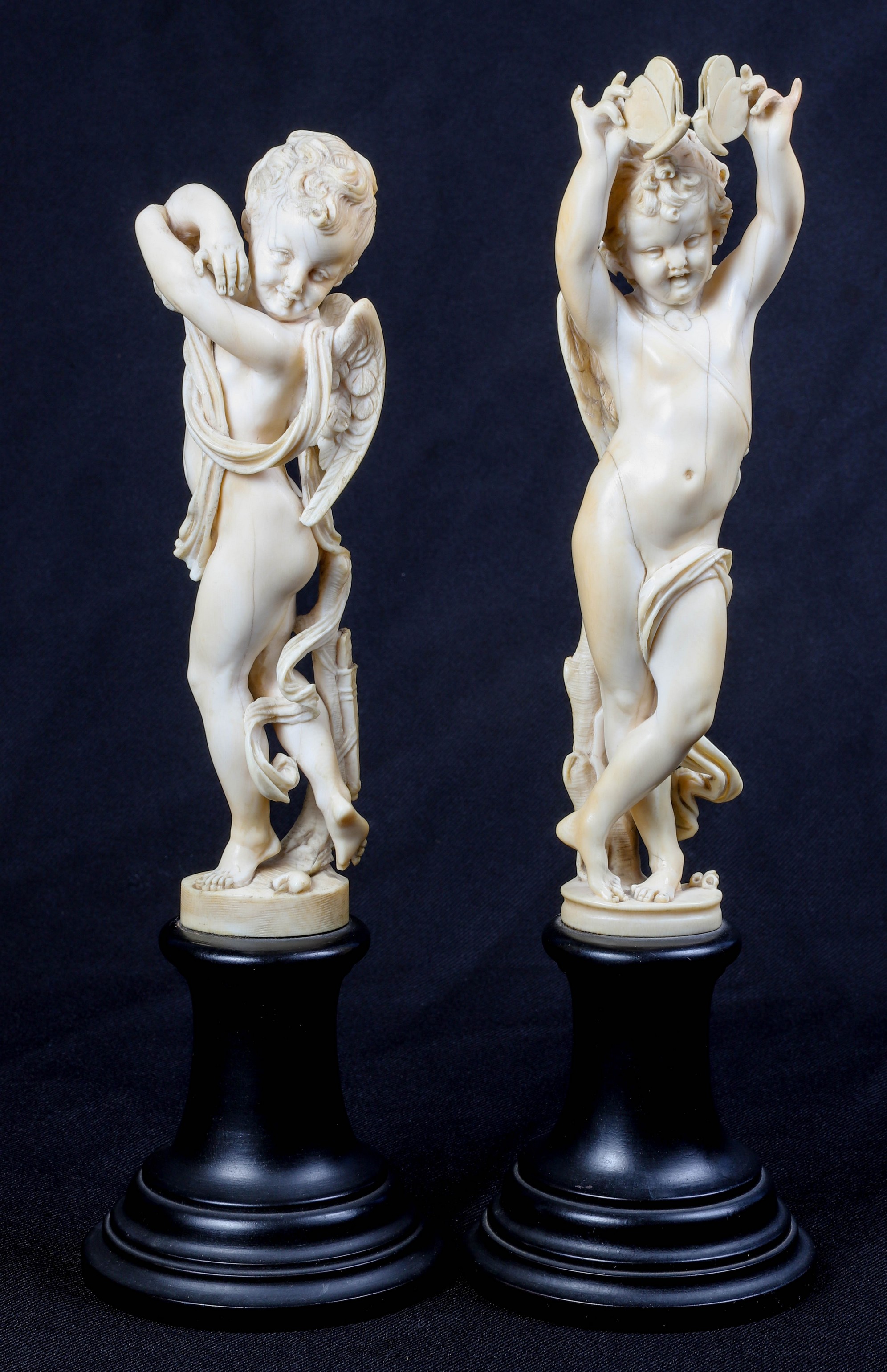 Continental carved ivory putti,