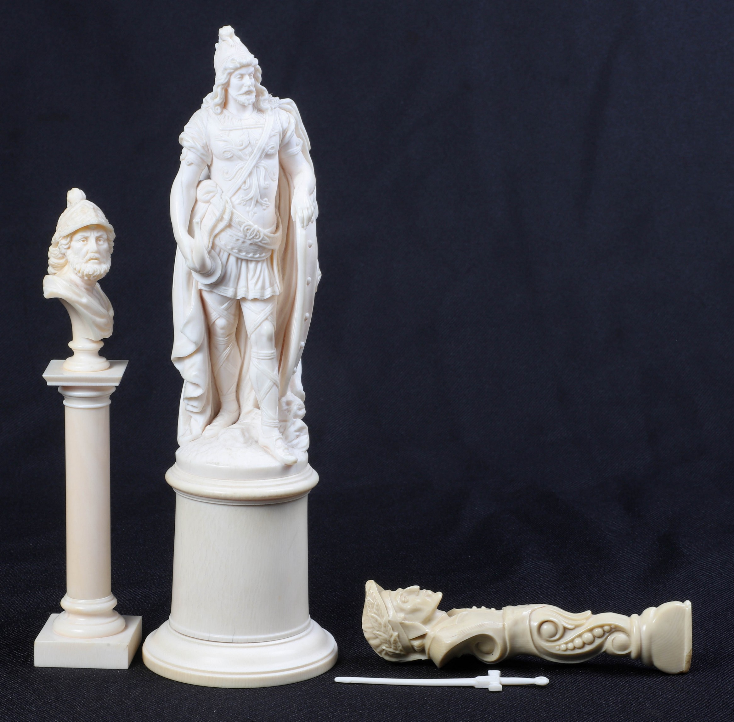 Ivory figure of a Roman, bust and knife