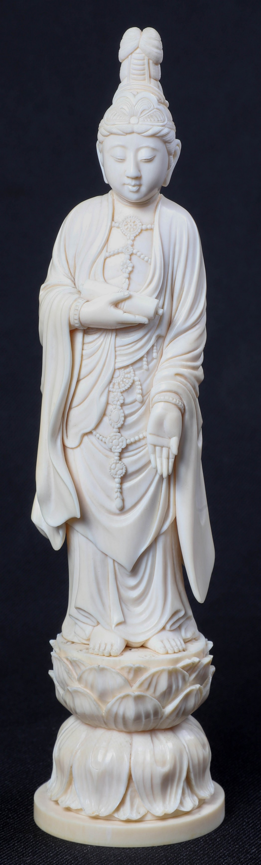 A carved ivory figure of Guanyin,