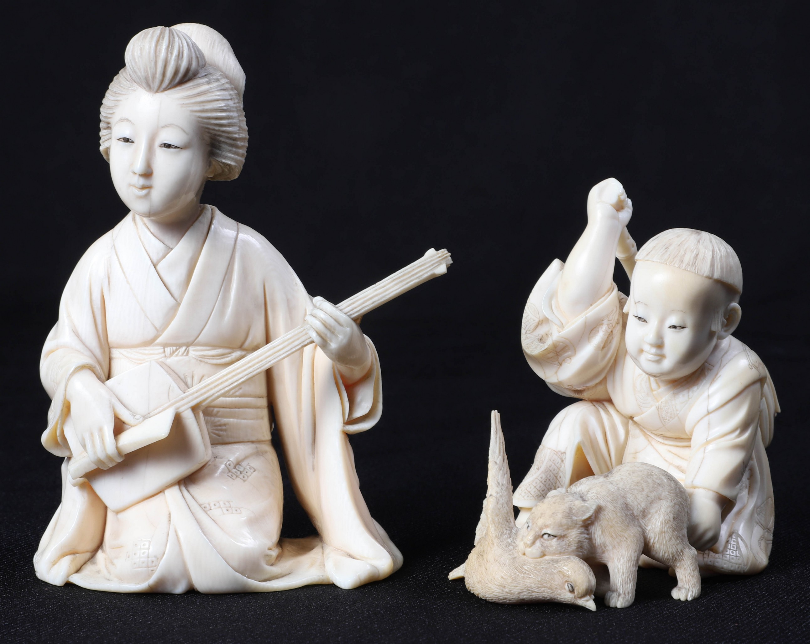 (2) Chinese carved ivory figures