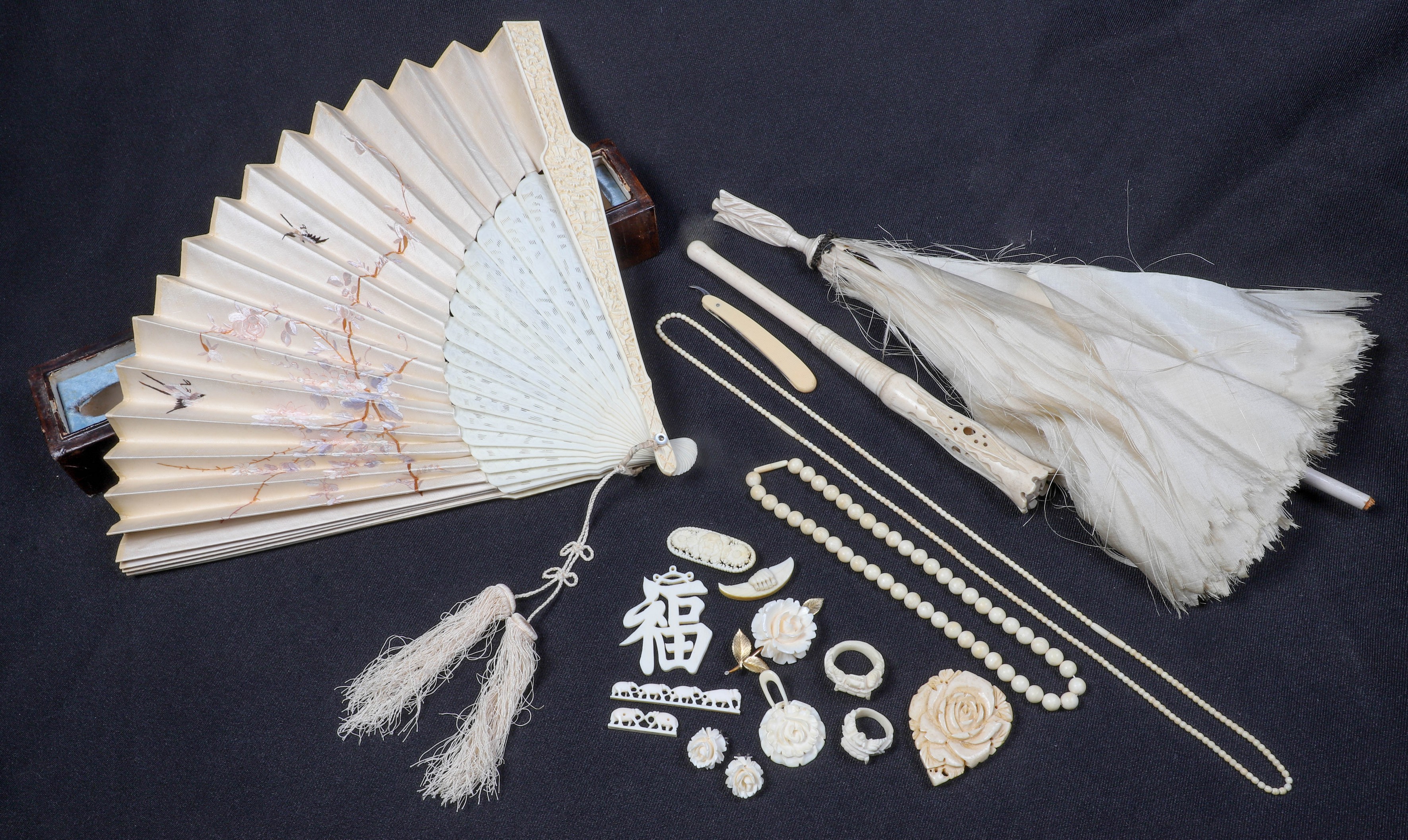Carved ivory fan jewelry and parasol  2e0d2b