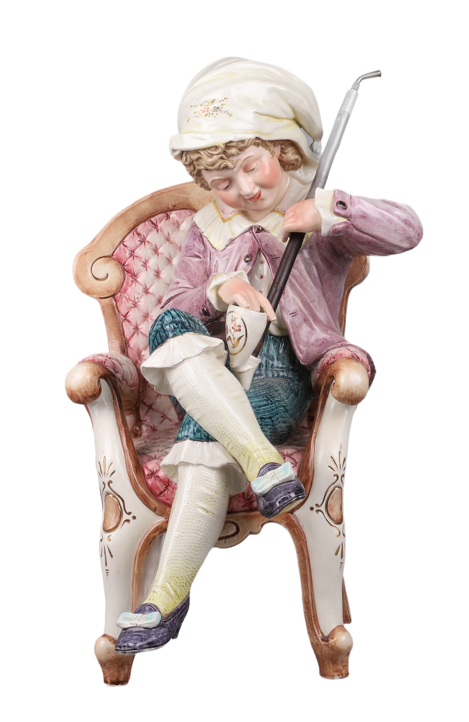Large porcelain figure, boy seated in