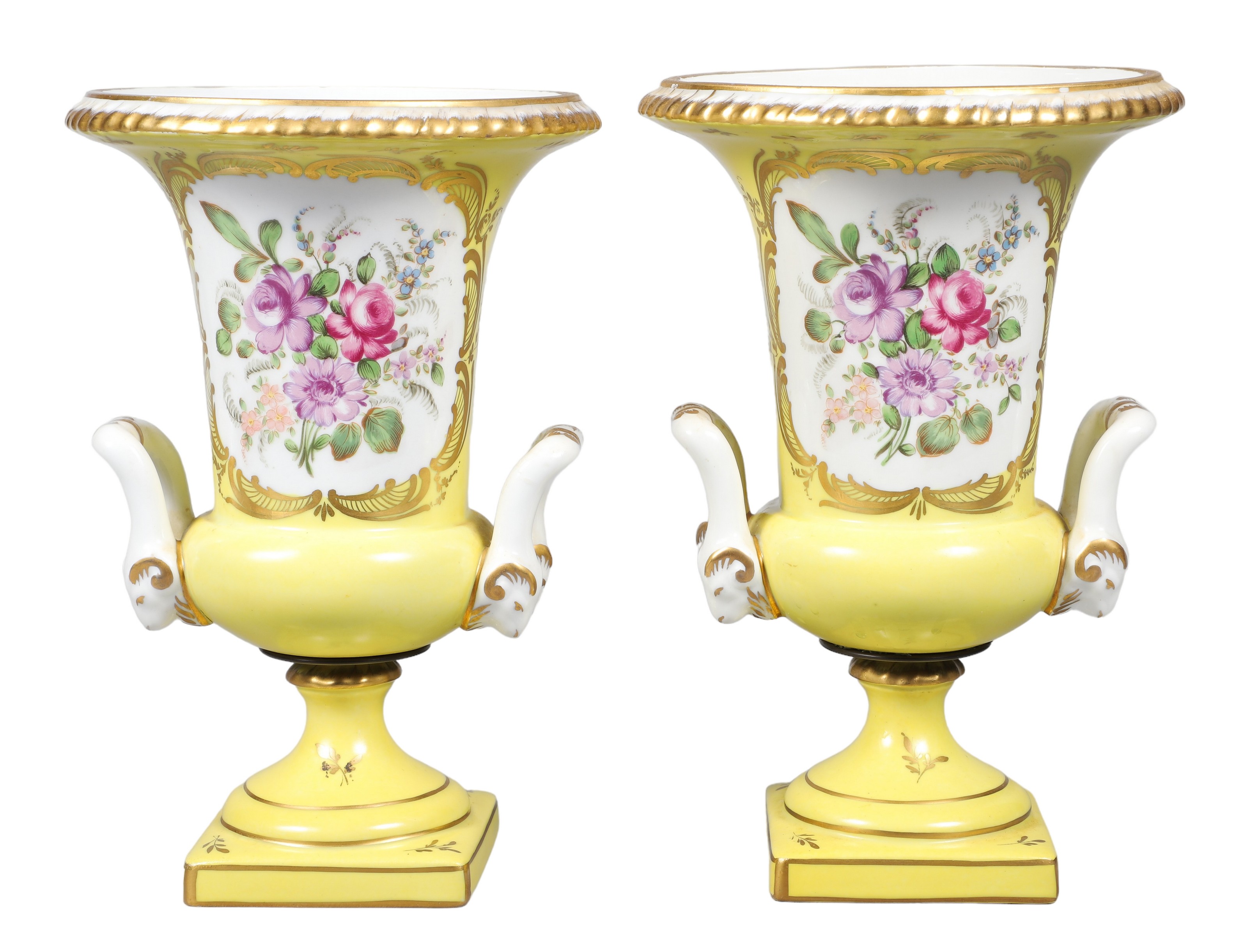 Porcelain de Paris parcel gilt urn pair,