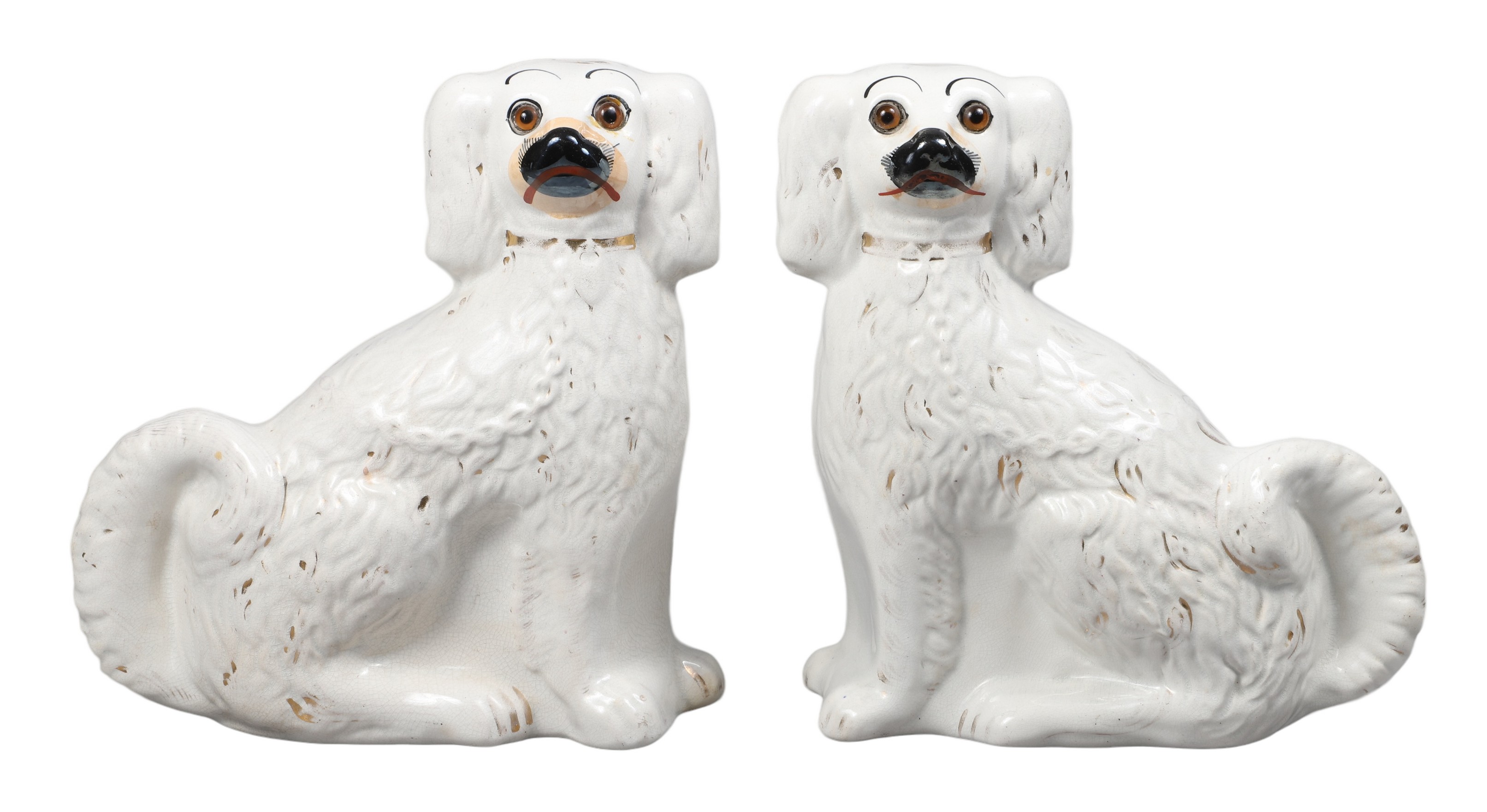 Pair of Staffordshire ceramic seated