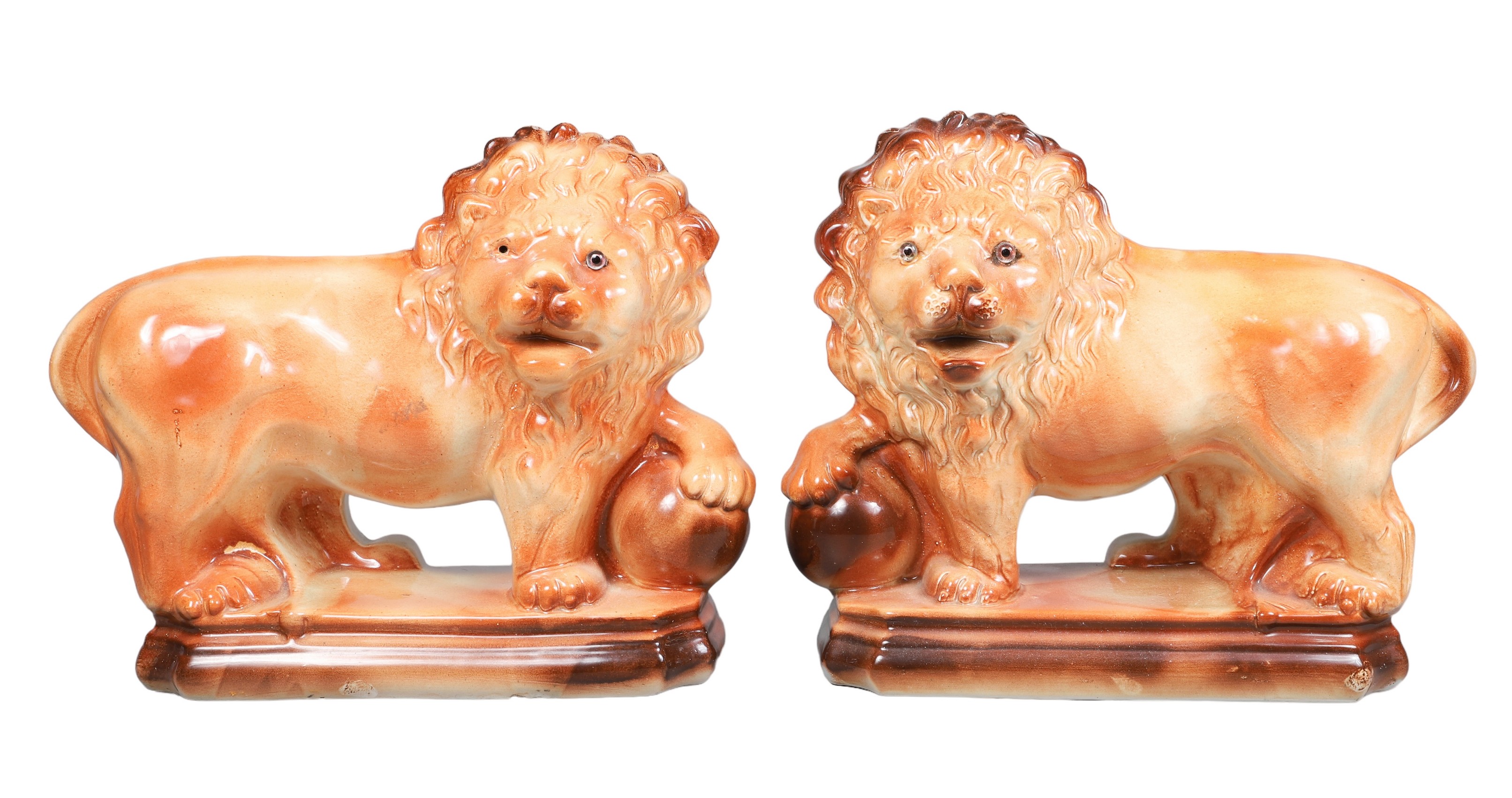 Pair of ceramic lions, early 20th