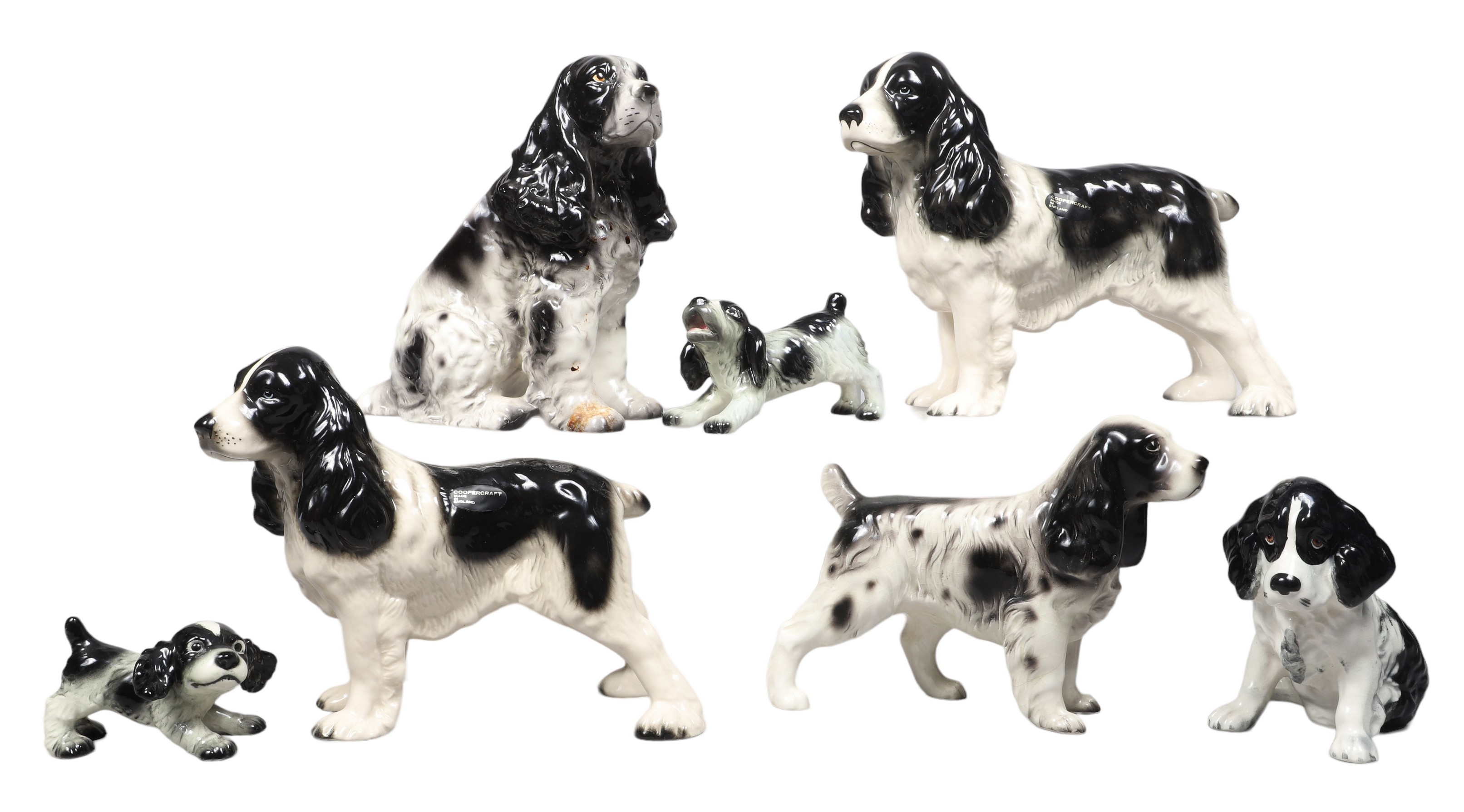  7 Porcelain Spaniel dog figurines  2e116d