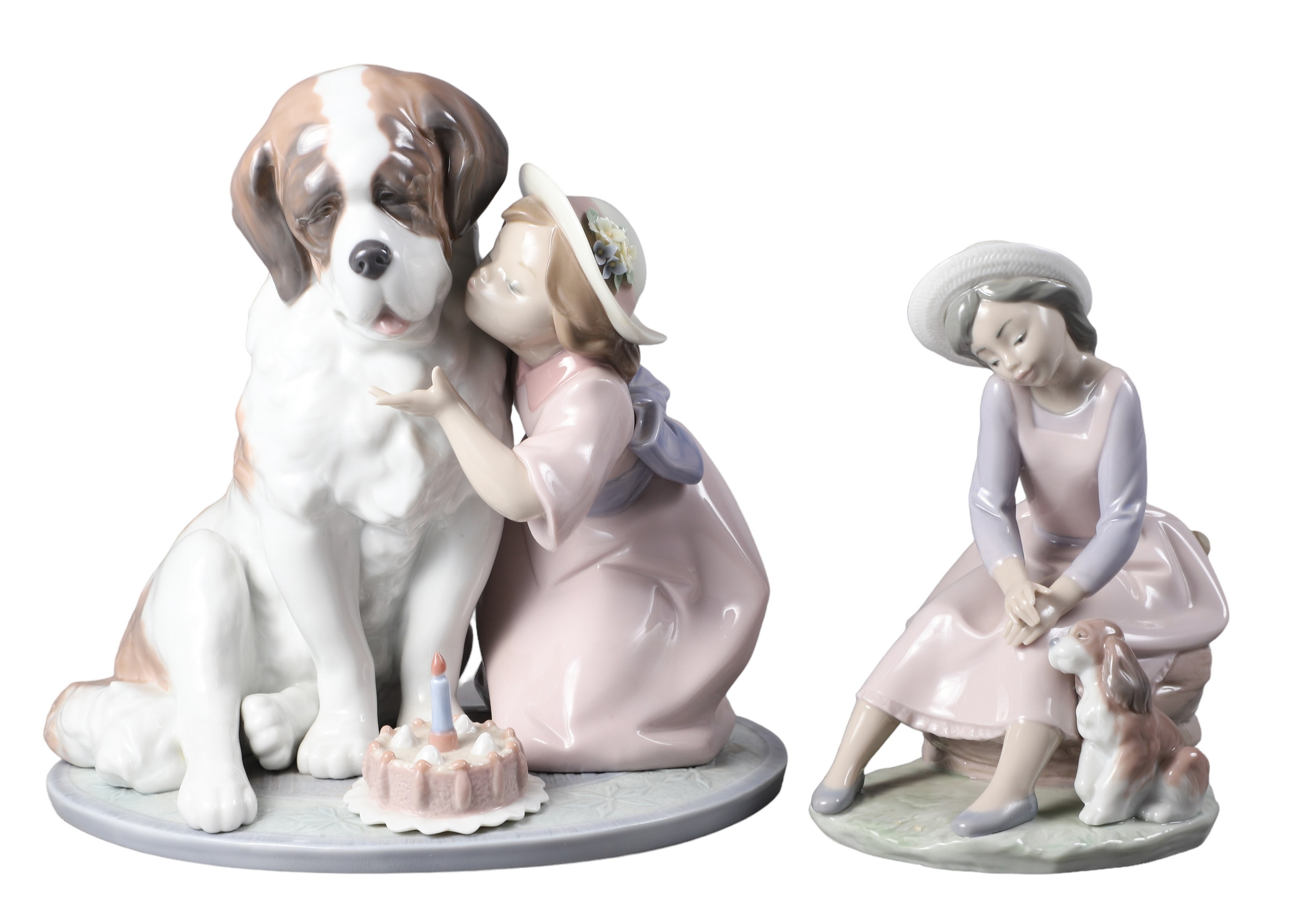 (2) Lladro porcelain dog figurines,