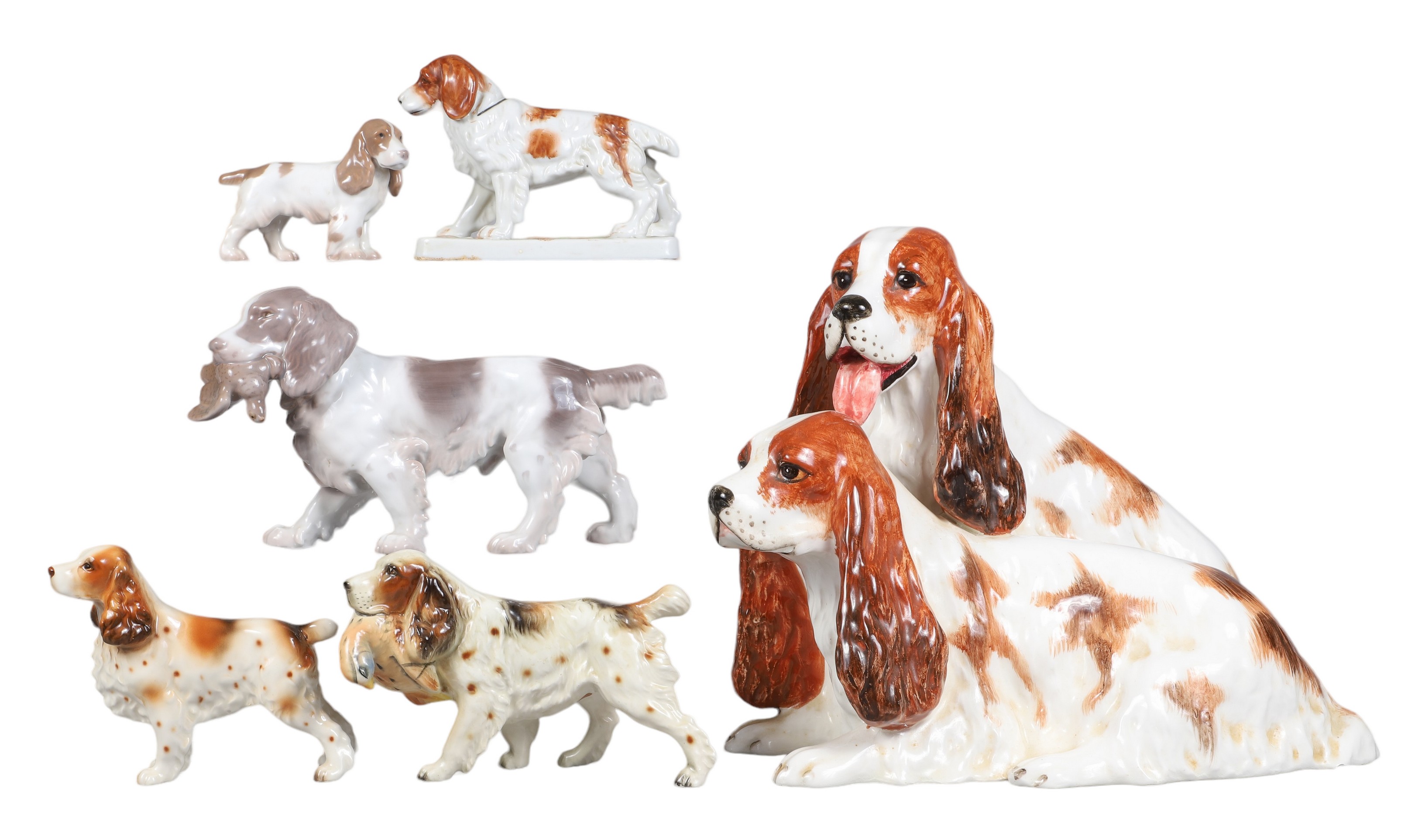 (6) Spaniel dog figurines, including