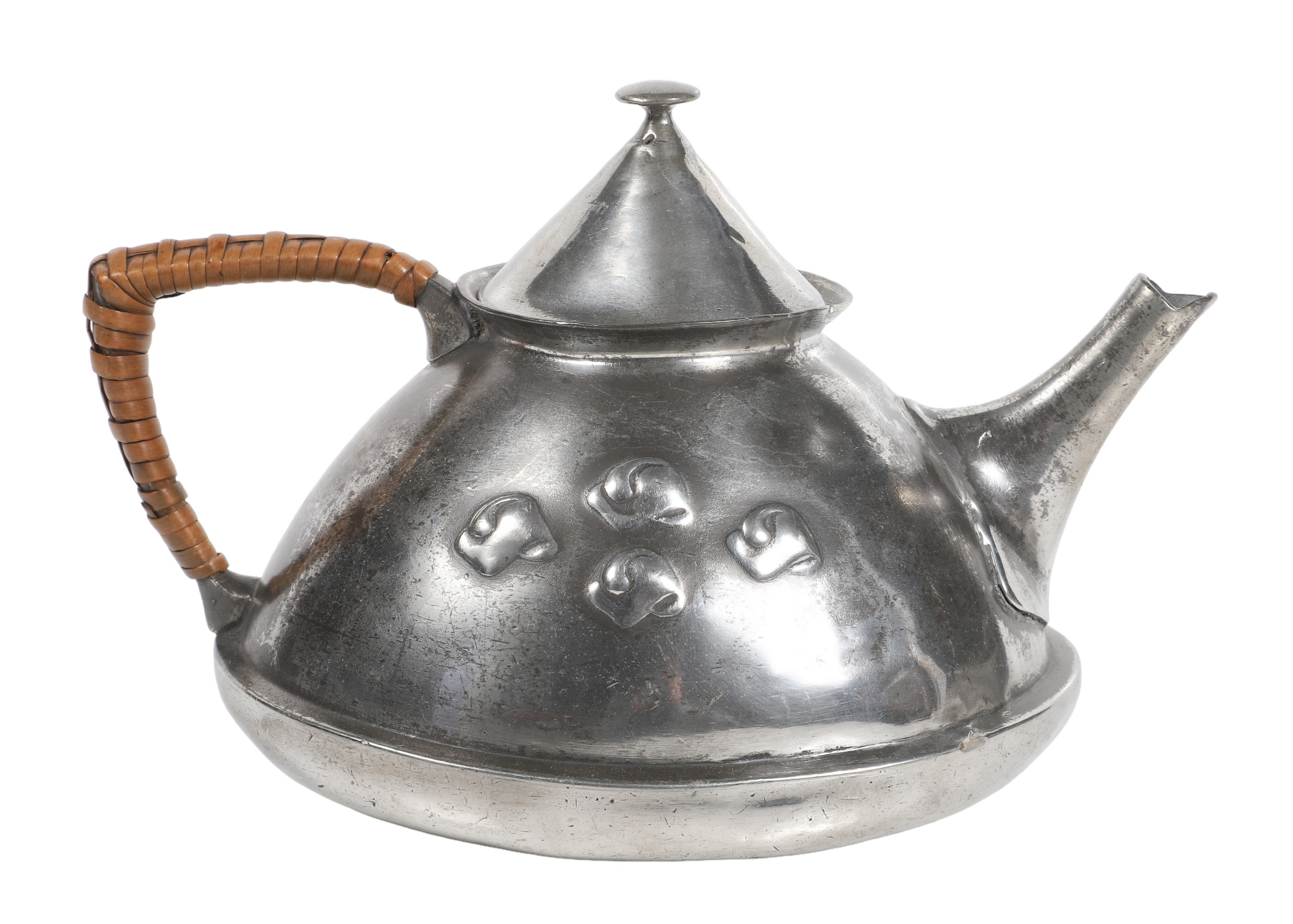 A teapot by Archibald Knox for
