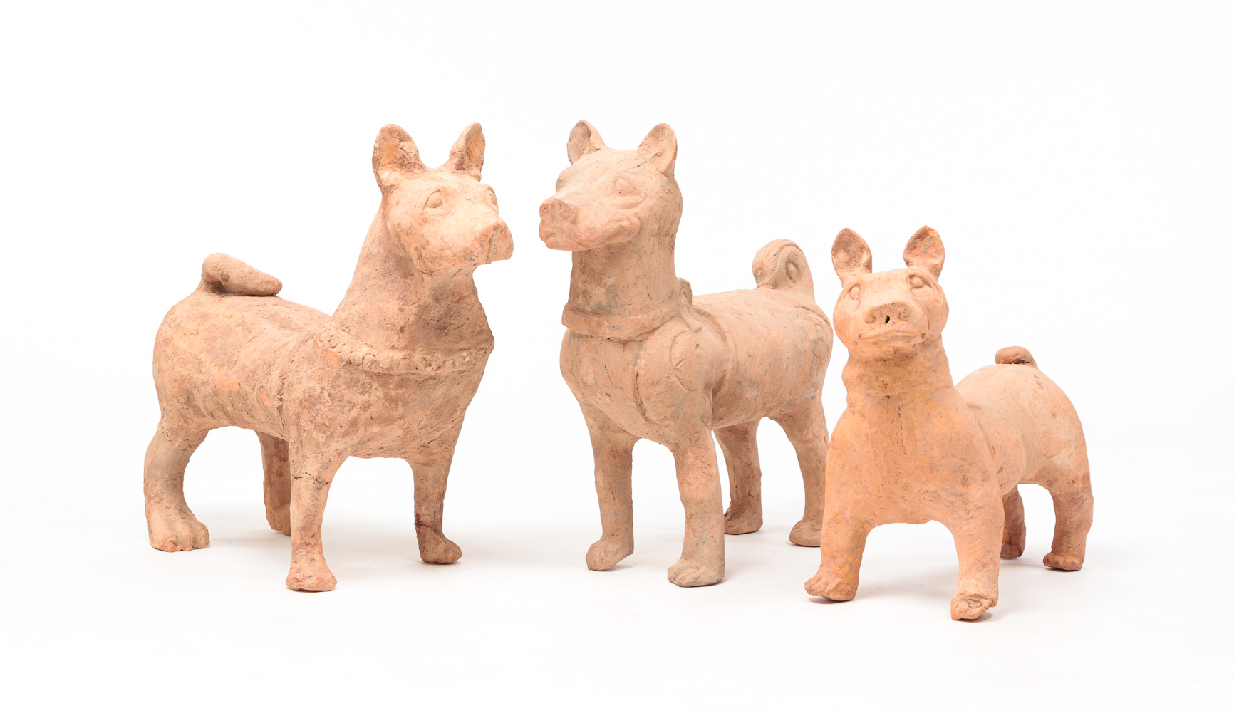 THREE CHINESE TERRA COTTA DOGS  2df908