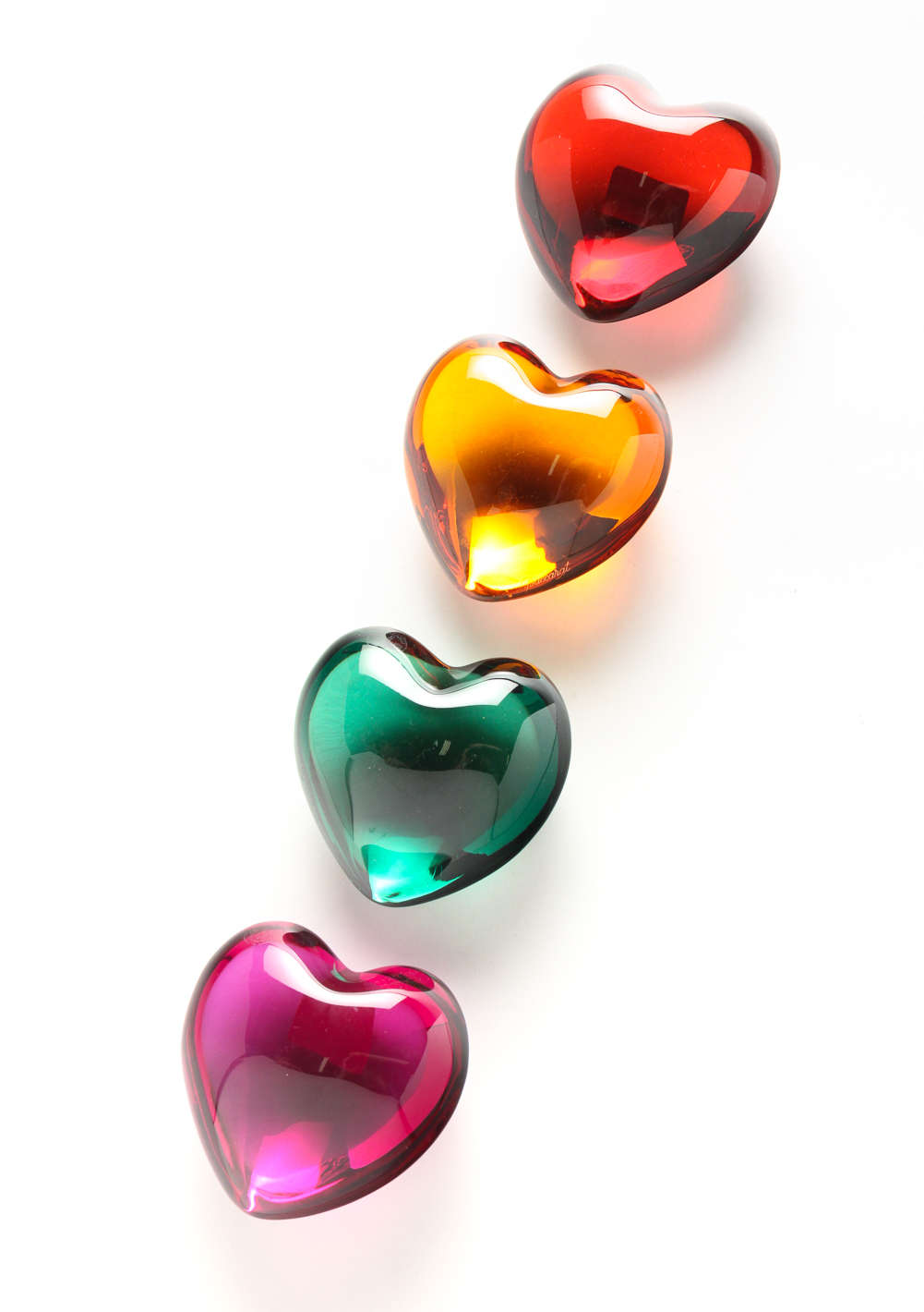 FOUR BACCARAT GLASS HEARTS. France,