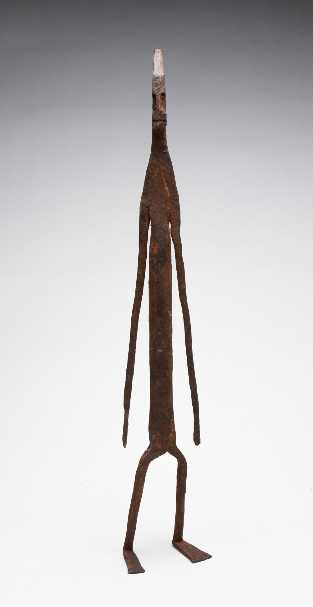 STYLIZED AFRICAN WROUGHT IRON FIGURE.