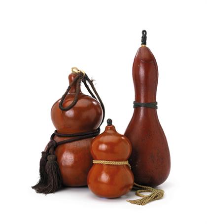 Two natural gourds and a red lacquered 4990a