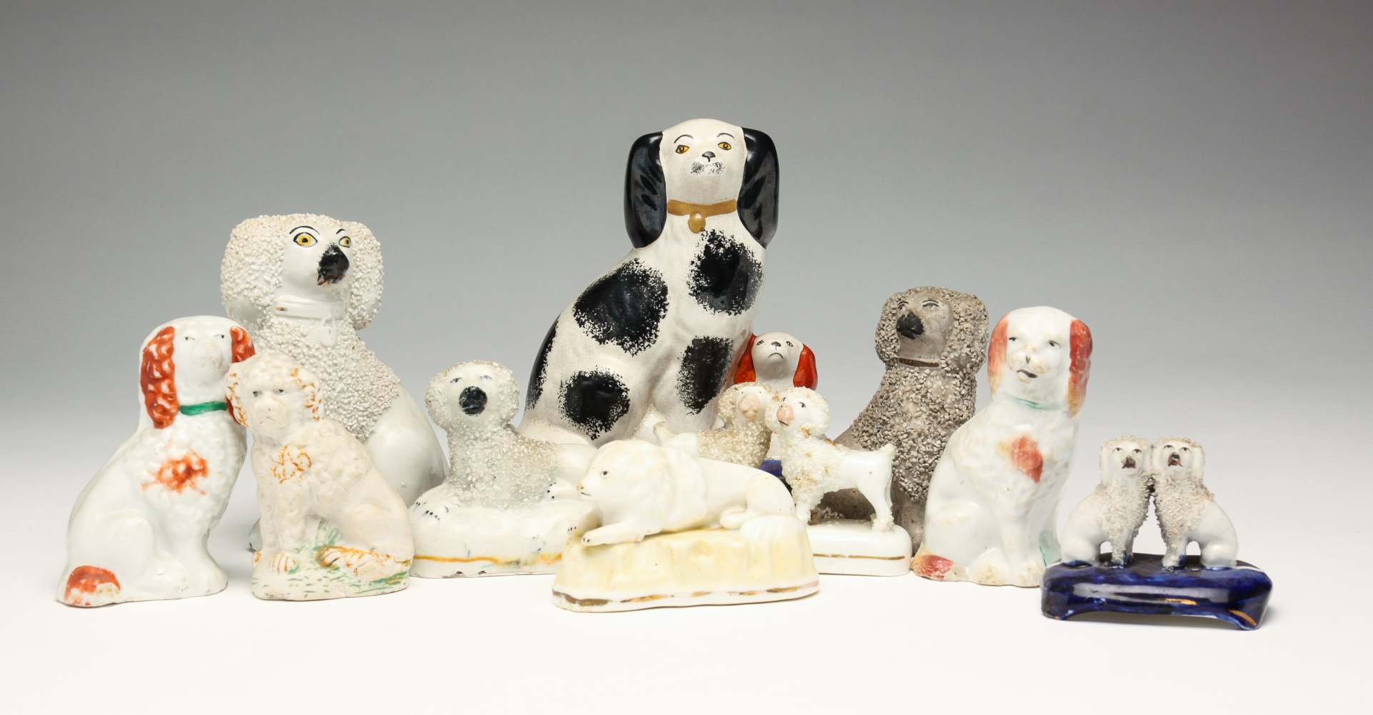 GROUP OF ELEVEN STAFFORDSHIRE DOGS.